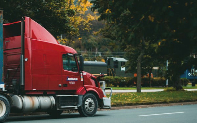 Unloading containers from a Toll truck